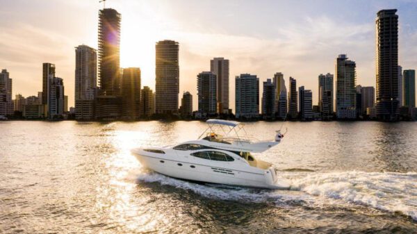 Azimut yacht docked at Cartagena marina with the skyline in the background