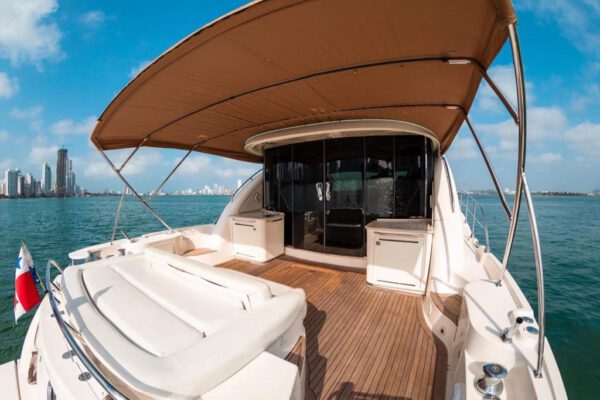 Couple enjoying ocean views from the flybridge of the 62ft Sea Ray