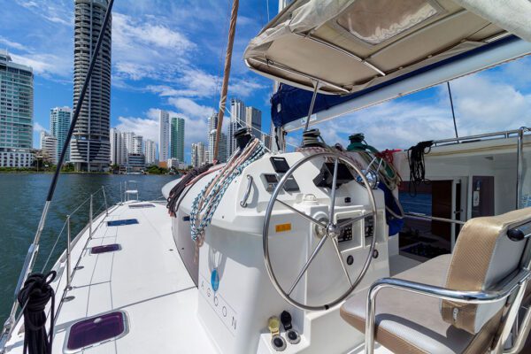 Back view of Xem 3 catamaran showing swim ladder and deck