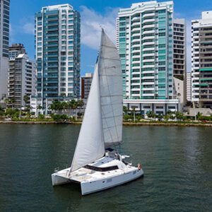 Chicote catamaran sailing through turquoise waters in Cartagena