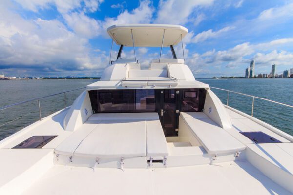 Wide shot of New Horizon catamaran floating in open water