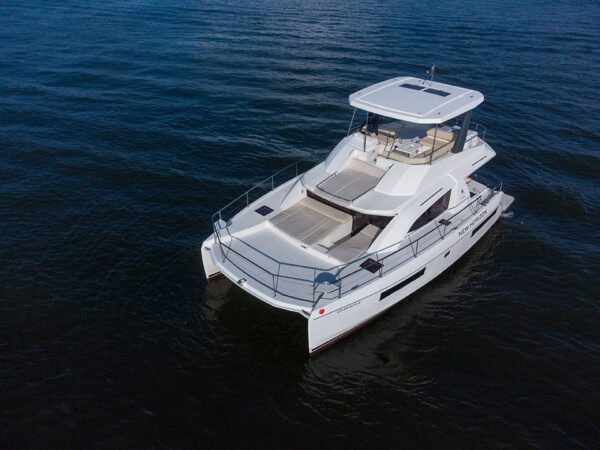 Back of New Horizon catamaran showing swim steps into ocean