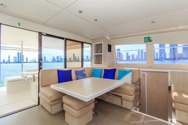 Guests enjoying the shaded seating area on Oddy Sea's stern
