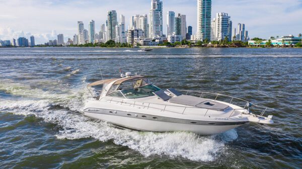 Dining setup on the Palladium yacht’s shaded outdoor lounge area