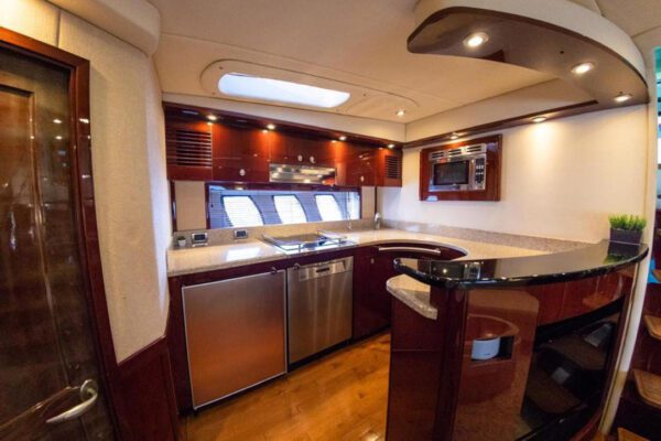 Spacious upper flybridge deck on the 62ft Sea Ray with seating area