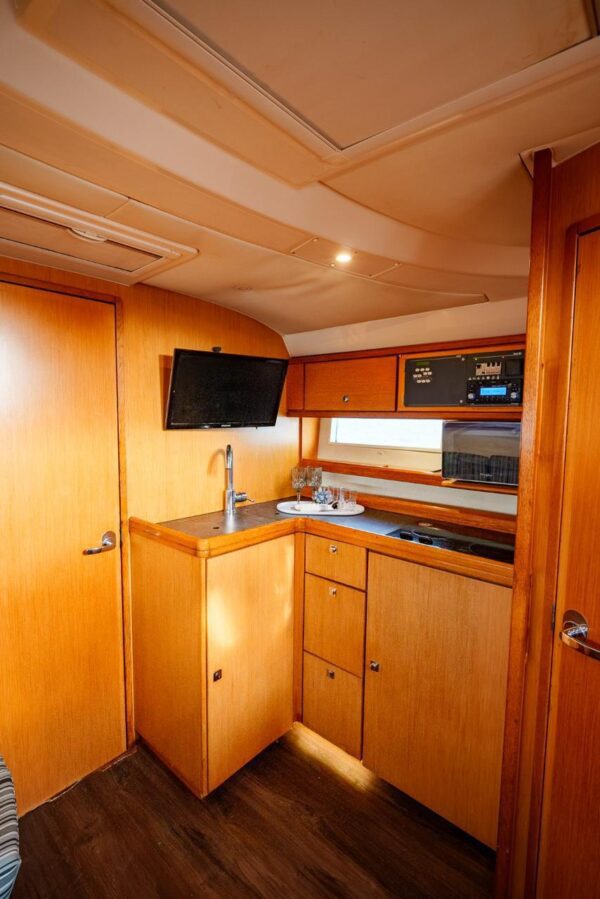 Ambar yacht with music and lights on during a party cruise
