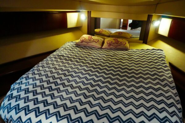 Comfortable bedroom cabin inside Chanul yacht