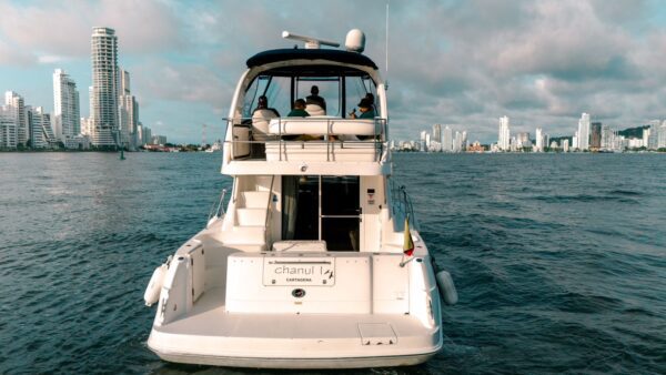 Chanul yacht cutting through calm waters at cruising speed