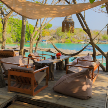 Shaded island beach club seating for a Cartagena family day trip