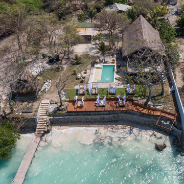 Deck and blue Caribbean water at Isla Mulata on the Cartagena island hopping tour.