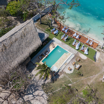 Drone view of Isla Mulata in the Rosario Islands during a shared Cartagena island tour.