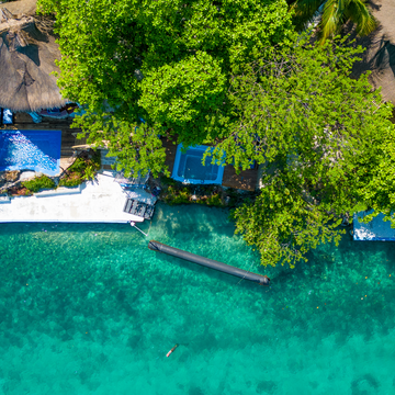 Aerial view of Isla Mulata with clear blue water on the Cartagena 3 Island Tour.