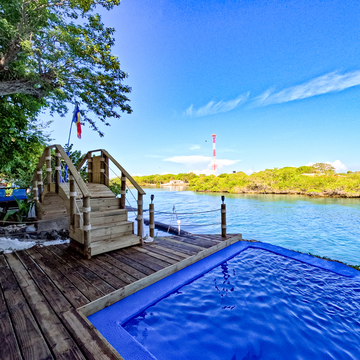 Swimming pool area at Ibbiza Beach Club during a shared island hopping tour from Cartagena.
