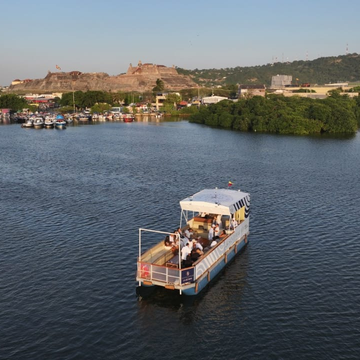 Santa María catamaran sailing through Cartagena Bay on a shared VIP sunset cruise with Botegena.